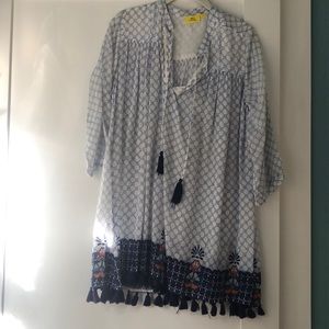 Long sleeve blue and white dress with tassels